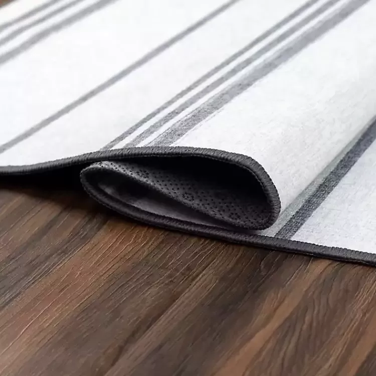 gray_and_white_stripe_washable_area_rug_x_2-1.webp Gray and White Stripe Washable Area Rug, 3x5>Kirklands Home Store