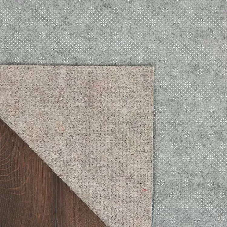 gray_reversible_nonslip_rug_pad_x_4-1.webp Reversible Non-Slip Rug Pad, 9x10>Kirklands Home Store