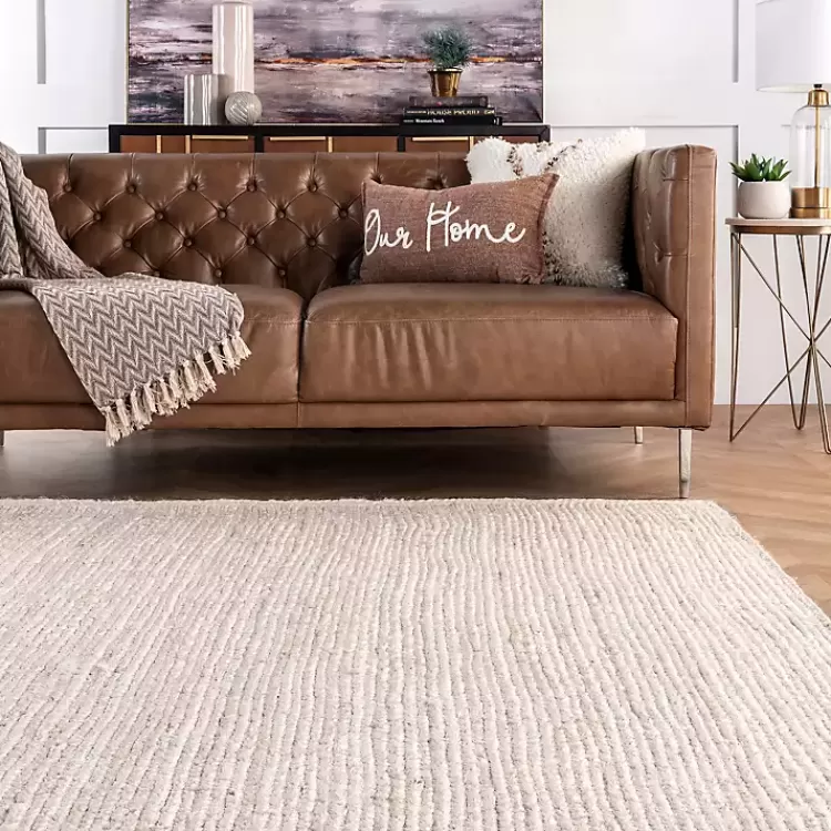ivory_hand_woven_rigo_jute_area_rug_x_2.webp Hand Woven Rigo Jute Area Rug, 9x12>Kirklands Home Store