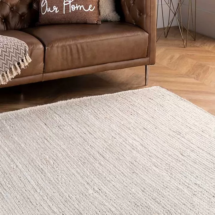 ivory_hand_woven_rigo_jute_area_rug_x_4.webp Hand Woven Rigo Jute Area Rug, 9x12>Kirklands Home Store