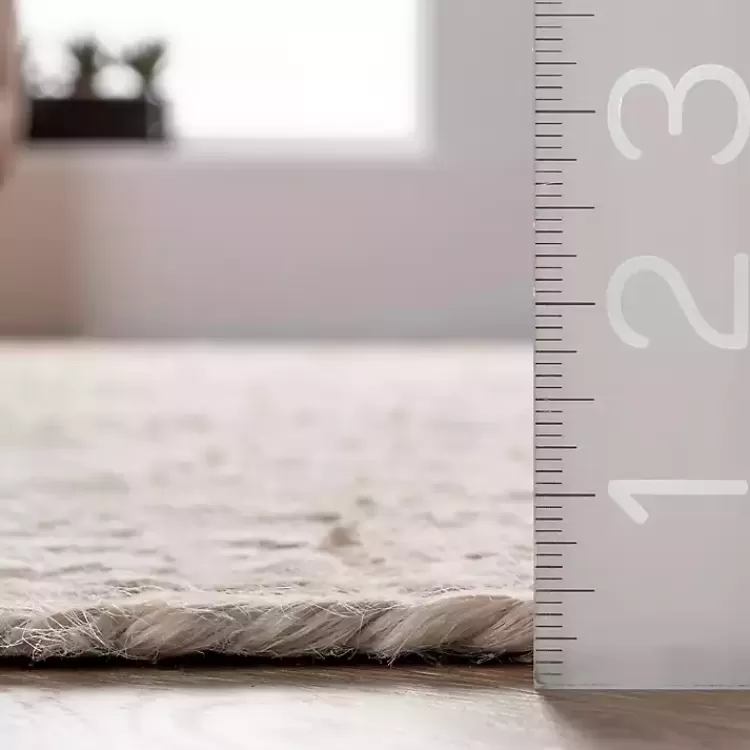 ivory_hand_woven_rigo_jute_area_rug_x_7.webp Hand Woven Rigo Jute Area Rug, 9x12>Kirklands Home Store